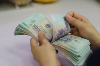 Lãi suất điều hành tăng ảnh hưởng ra sao đến ngành ngân hàng, doanh nghiệp và thị trường chứng khoán?